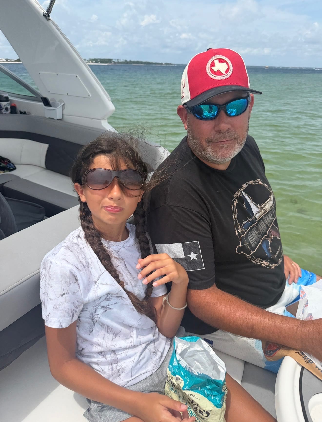 A family on a Salty Crook charter on the Emerald Coast