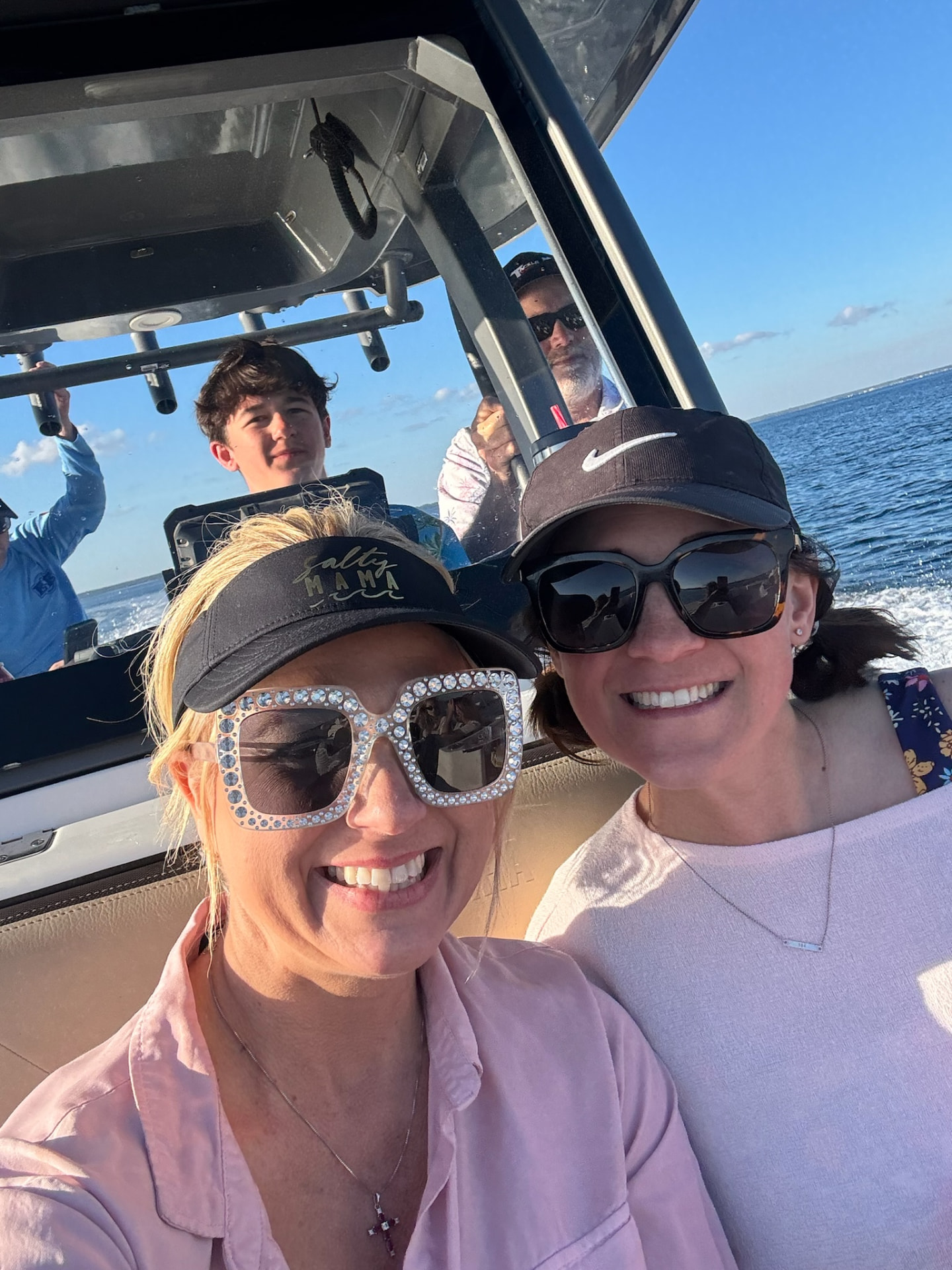 Guests aboard the Salty Crook charter boat on the Emerald Coast