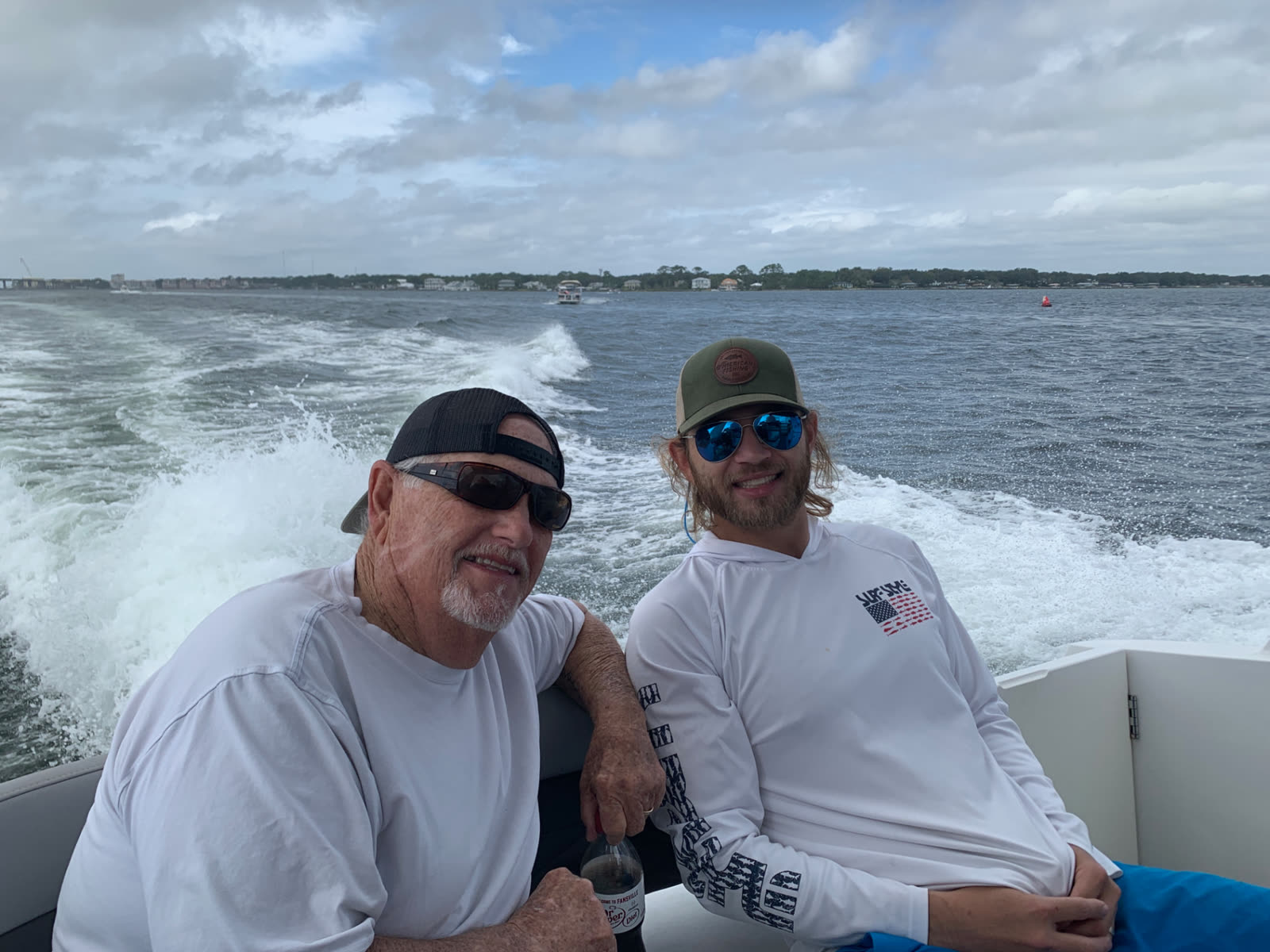 Charter guests aboard the Salty Crook yacht near Destin